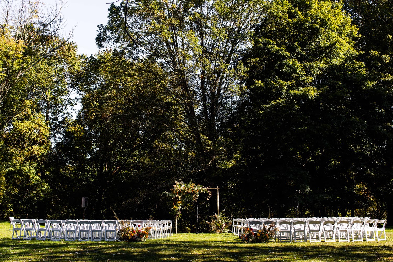Outdoor fall wedding ceremony at the Hasbrouck House